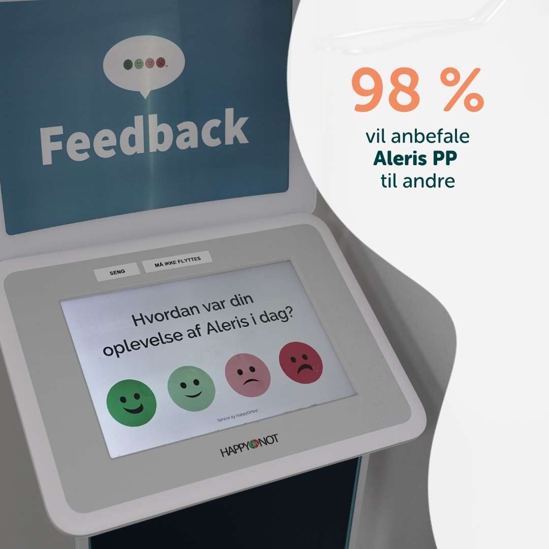 Et billede af en Happy ot Not-stander hos Aleris PP, hvor kunden kan trykke forat angive sin tilfredshed.